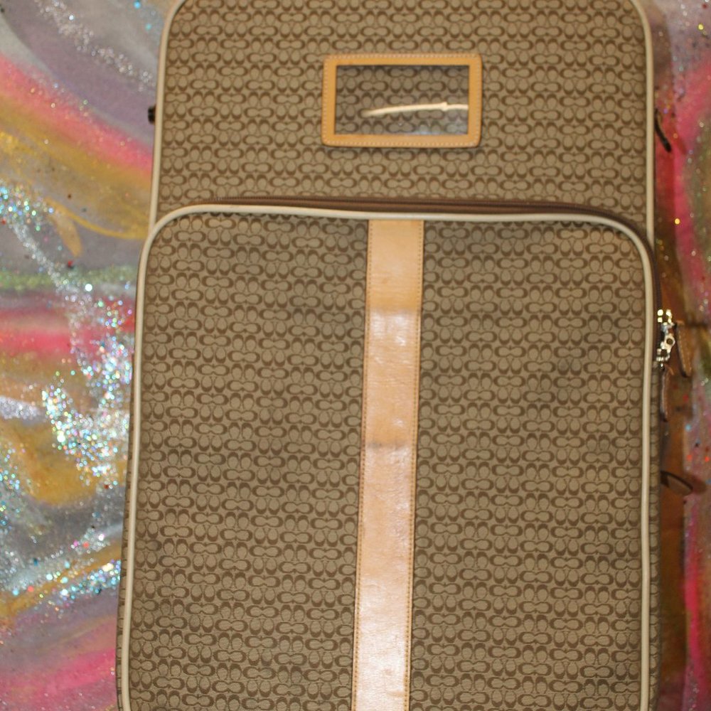 SOLD Brown signature coach carry on suitcase